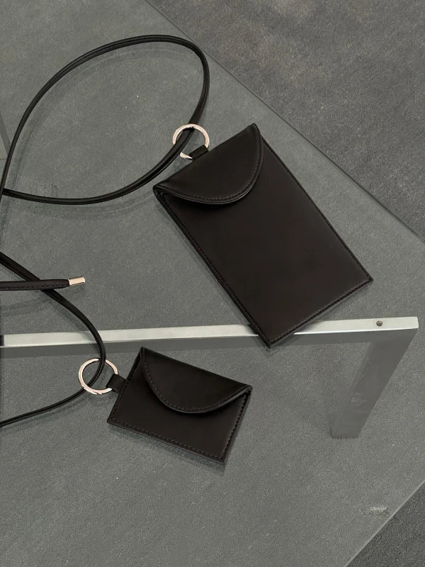 Pochette téléphone à anse Sling en cuir végan Noir - Image 6